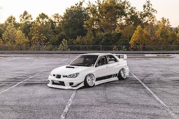 White Parked Sedan 