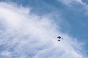 white passenger plane on sky during daytime