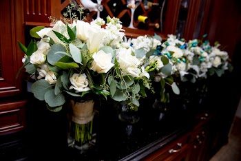 White Petaled Flowers In Vases 