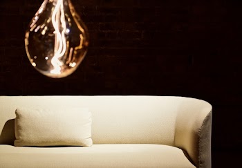 White Pillow on White Leather Sofa