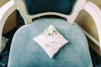 White Pillow on White Wooden Armchair