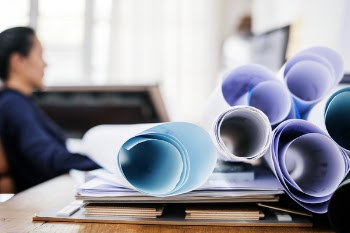 White Printer Paper Roll on Desk