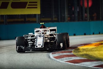white racing car on road