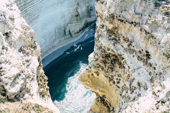 White Rock Formation and Blue Body of Water