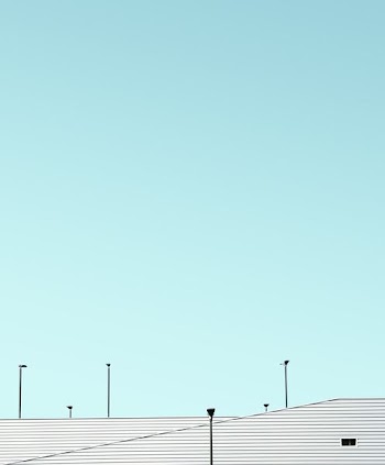 white roofs and teal sky