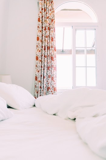 White Room with Floral Curtain