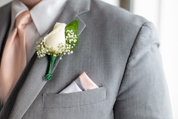 White Rose On A Suit