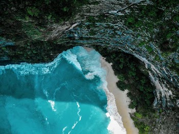 white sand beach during daytime