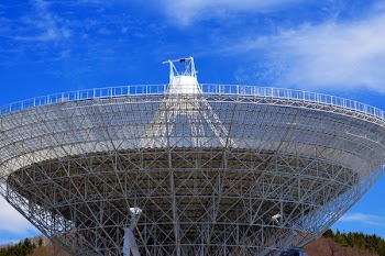 White Satellite Under Cloudy Sky