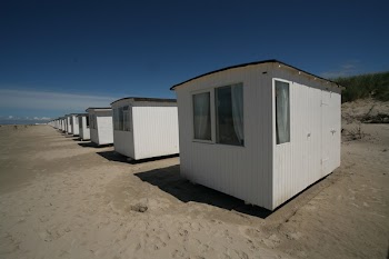White Sheds on Gray Sands