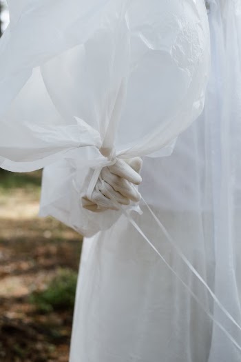 White Sheer Textile on Green Grass Field