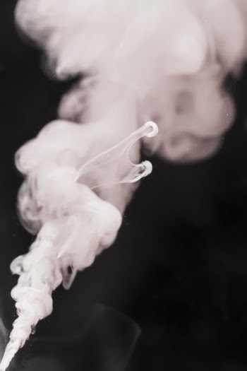 White smoke with black background Free Photo