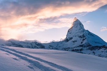 white snowy mountain under clear blue sky