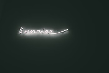 white Sunrise neon light signage