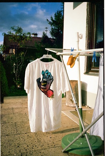 White T-shirt on Clothes Rack