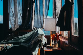 White Table Lamp Beside Window