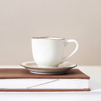 White tea cup on a book | Free Photo - rawpixel