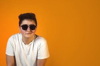 White Tshirt Sunglasses And A Smirk