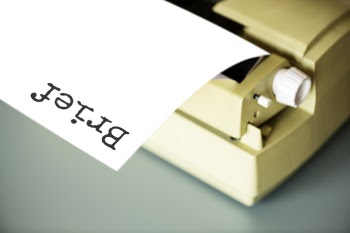 White Typewriter on Gray Table