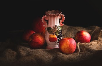 White Vase Beside Apples