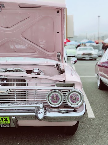 White Vehicle in Road Close-up Photography