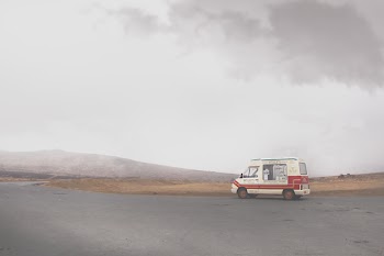 White Vehicle in the Middle of the Road