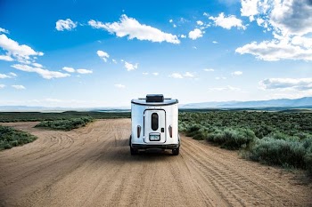 white vehicle on desert