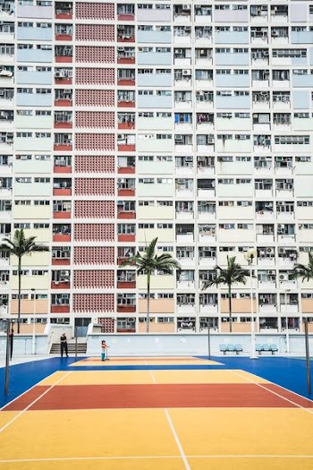 white wall paint high-rise building during daytime