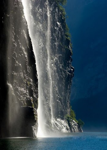 White Waterfall With Blue Calmed Body of Water