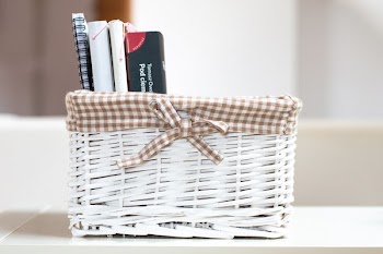 White Wicker Case Filled With Books