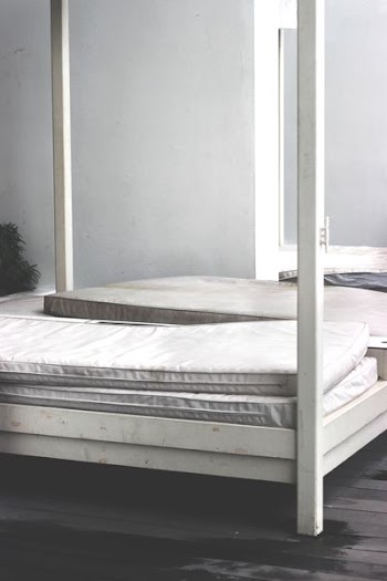 white wooden bed frame