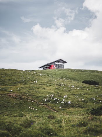 White Wooden House on Top of Hill