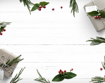 White Wooden Surface With Leaves And Boxes