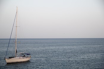 White Yacht on Ocean during Cloufy Day