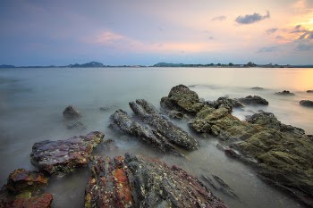 Wide Angle Photo of Body of Water Under Cloudy Sky