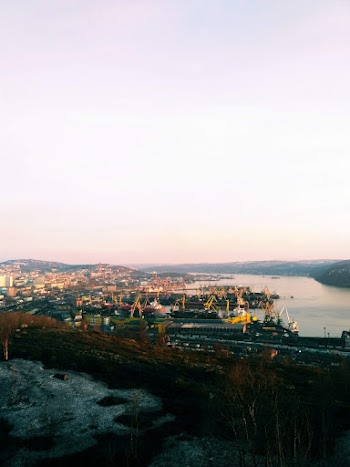 Wide-angle Photography of Buildings Near Body Of Water