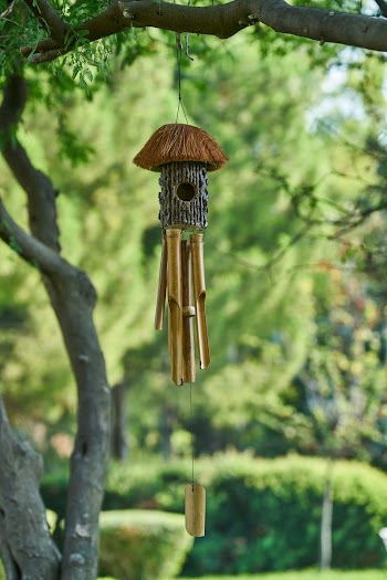 Wind Chime Hanging Under Tree