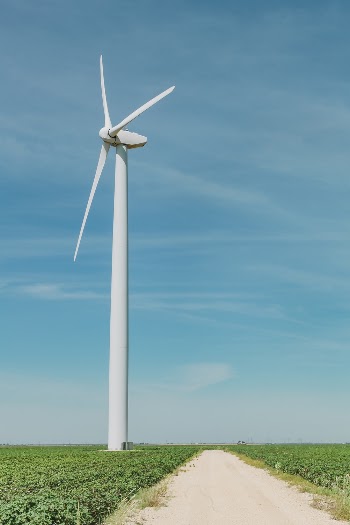 Wind Turbine by the Dirt Road at the Plains