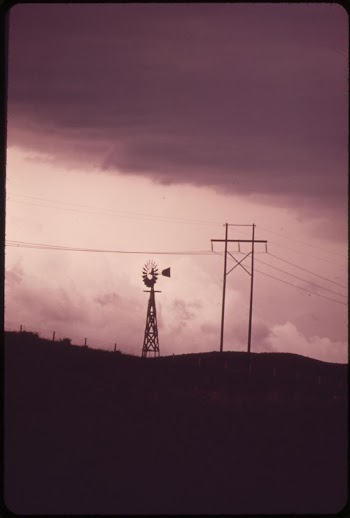 Windmill and power lines near the Dave | Free Photo - rawpixel