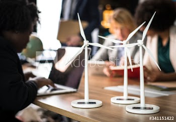 Windmill models on a meeting table