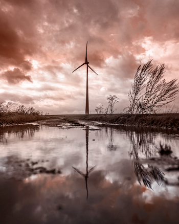 Windmill Near Body of Water