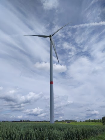 Windmill On Grass Field