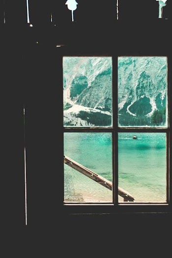 window-view of boat on water