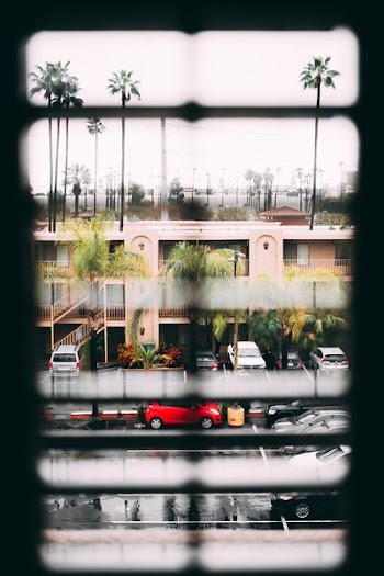 window view of houses in city