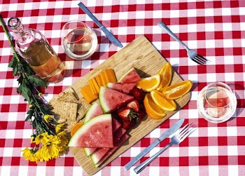 Wine And Fruit On Picnic Table