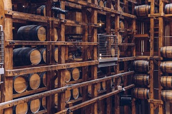 Wine Barrels In Wooden Structure