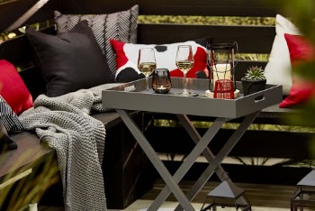 Wine Glasses on table Near Pillows