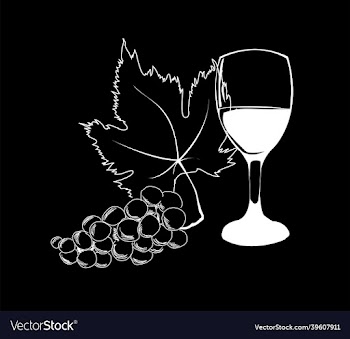wine in wineglass and grapes with leaf