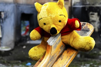 Winnie the Pooh Plush Toy on Seesaw