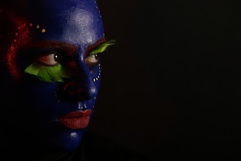 Woman's Face Covered with Face Paint